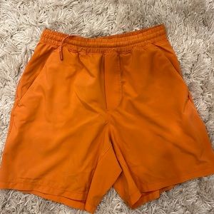 Lululemon Orange Pacebreaker Shorts
